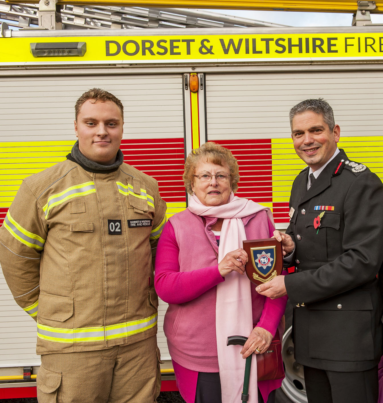 Jill Matthews with her grandson Ben and Chief Fire Officer Ben Ansell